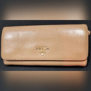 610. Preloved Prada timeless tan long wallet